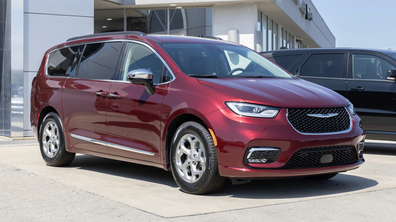 A red Chrysler Pacifica parked