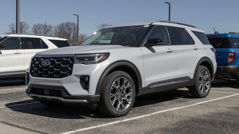 A gray Ford Explorer parked