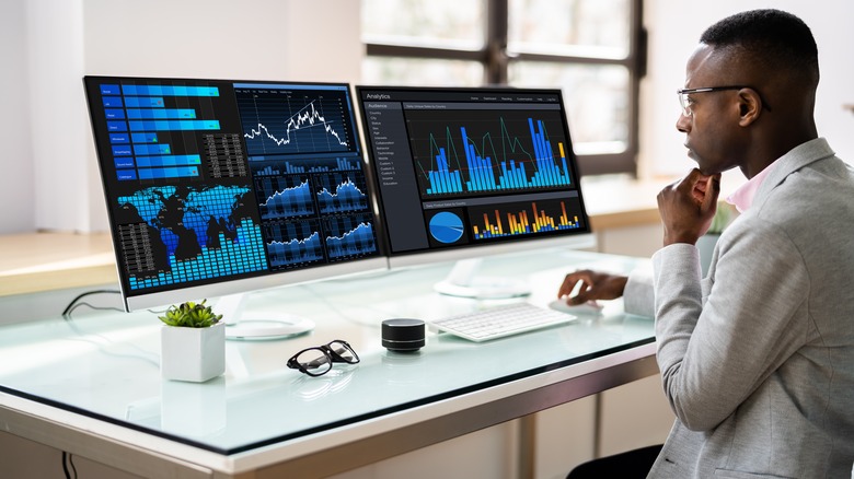 Scientist using PC monitors