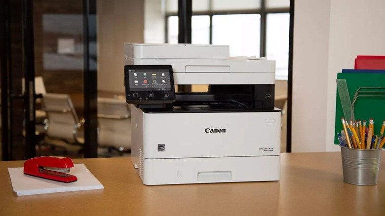 Canon printer sitting on office desk