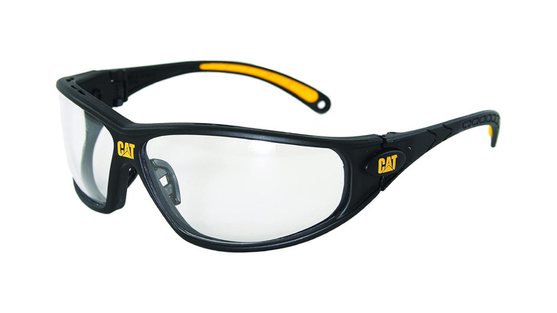 A pair of safety glasses branded CAT