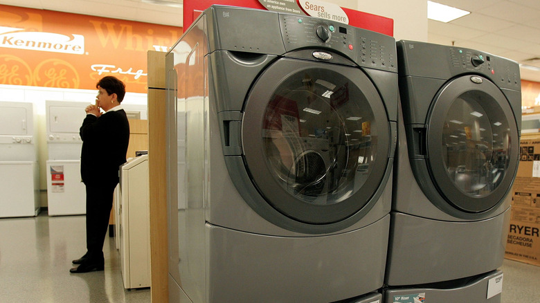 A Whirlpool washer and dryer set on display at a store