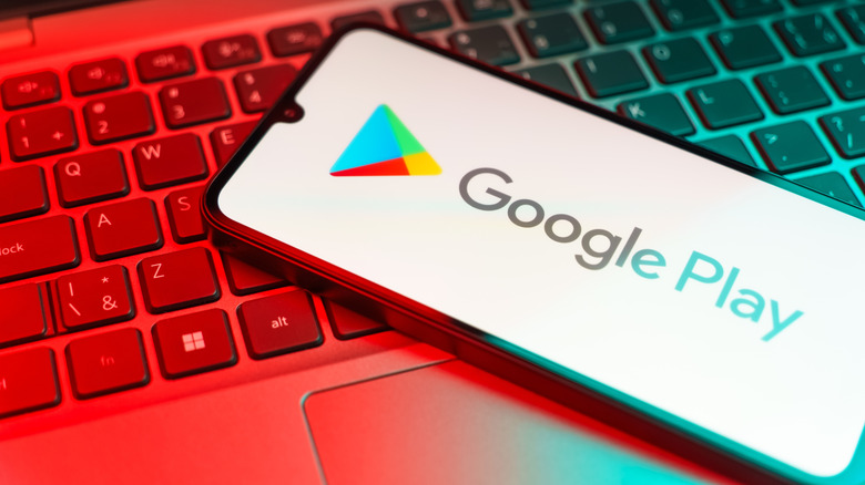 Smartphone on surface showing Google Play logo