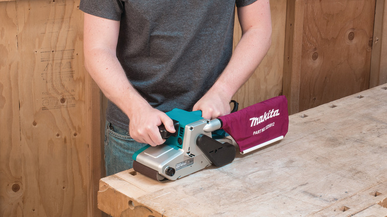 Makita belt sander in action