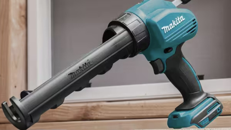 Empty Makita caulk gun without a battery