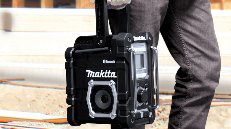 Makita Bluetooth radio being carried