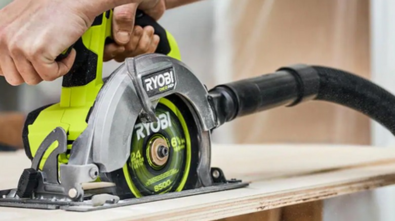 Ryobi saw with vacuum hose