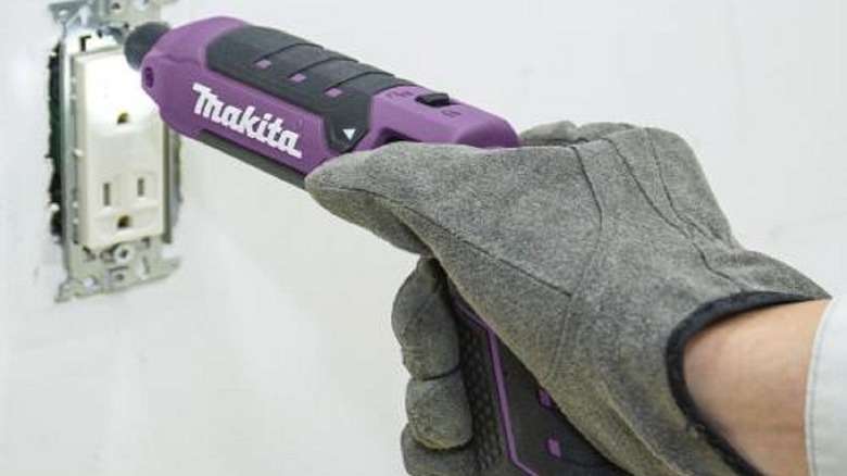 A purple pen impact driver from Makita