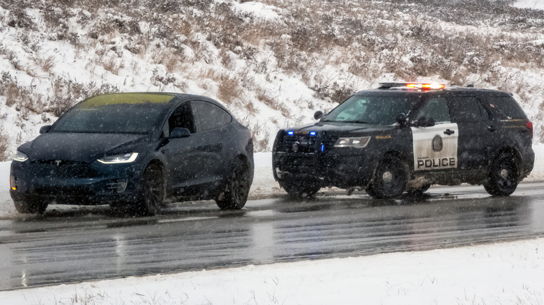 tesla pulled over by police in snow