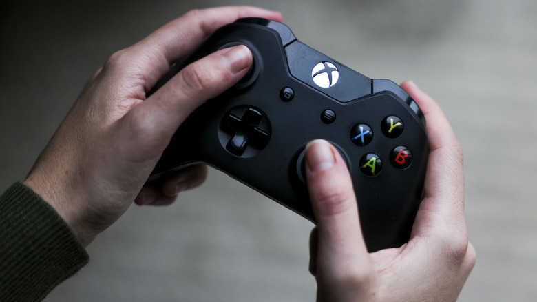 Xbox controller held in hands