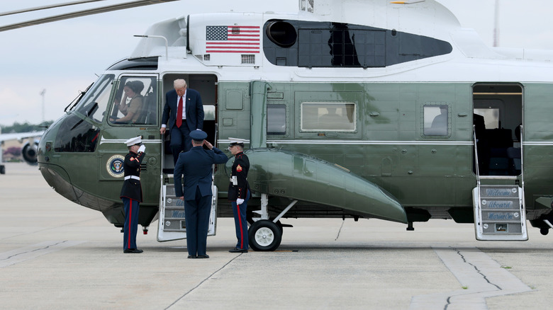 U.S. President Donald Trump walks from Marine One