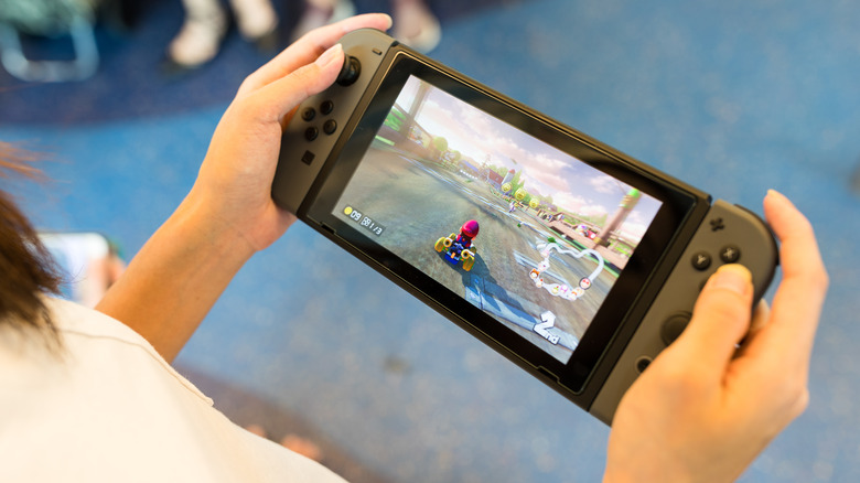 Person playing Mario Kart