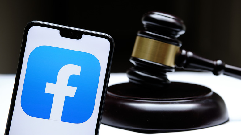 Facebook logo next to gavel