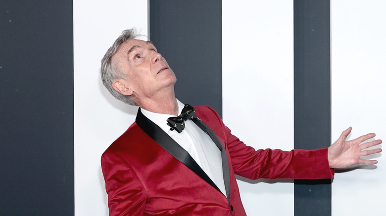 Bill Nye looking up