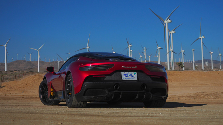 Maserati MC20 in front of wind farm