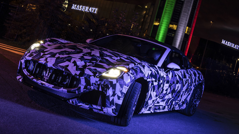 maserati grancabrio driving dealership night