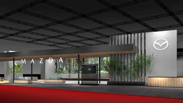 Mazda's render of its 2025 Japan Mobility Show booth with the new logo and wordmark