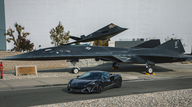Darkstar aircraft and McLaren Artura parked