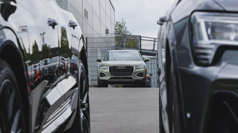New Audi vehicles parked outside of dealership