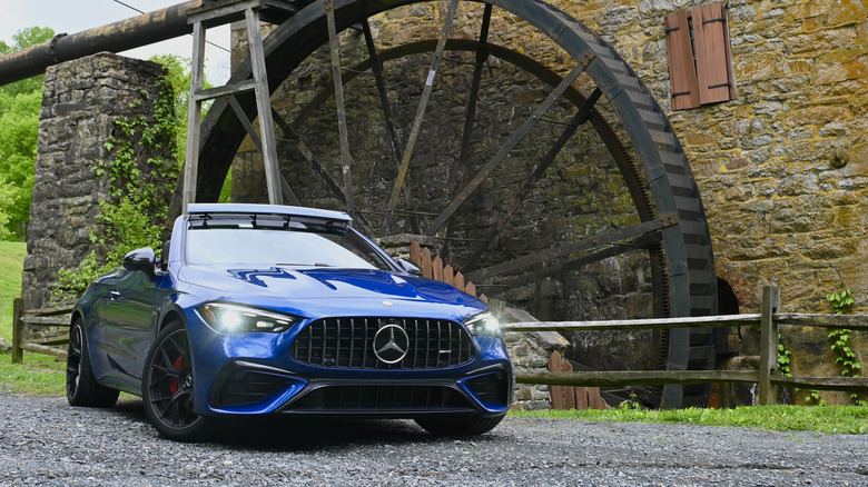 2026 Mercedes-AMG CLE 53 in front of water wheel