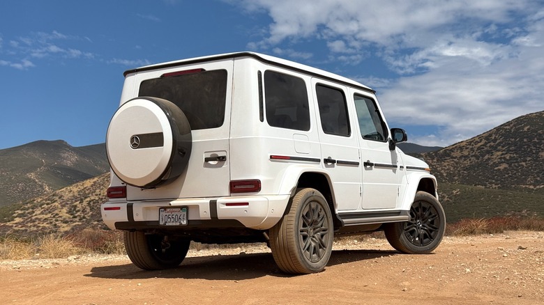 2026 Mercedes-Benz G 580 parked on dirt in front of mountains