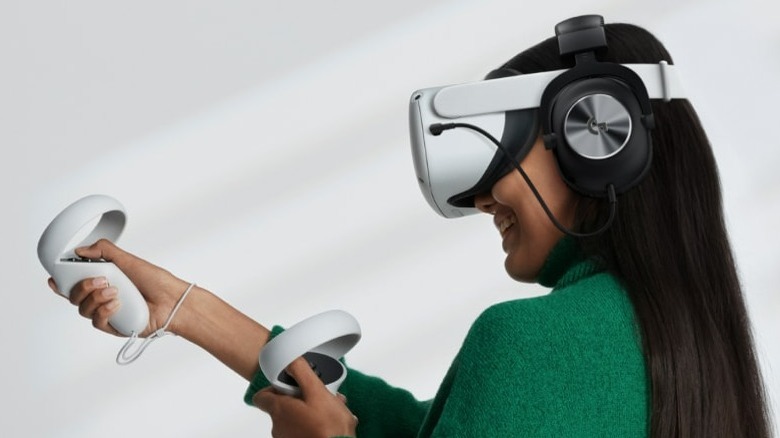 a woman wearing a Logitech G PRO Gaming Headset for Meta Quest 2