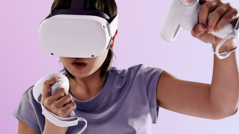a woman playing with the Meta Quest 2 Active Pack 