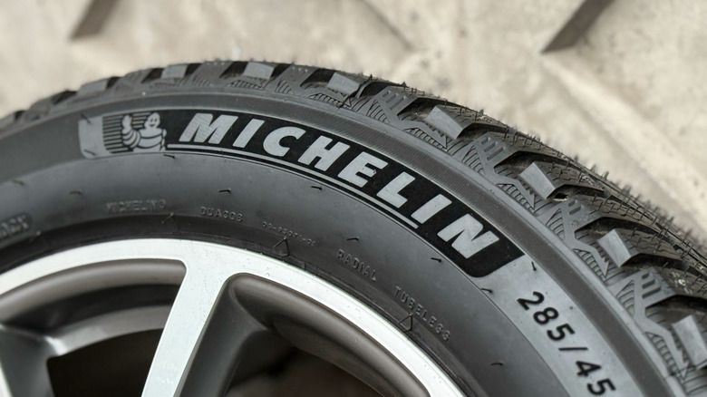 Close-up of Michelin logo on a tire