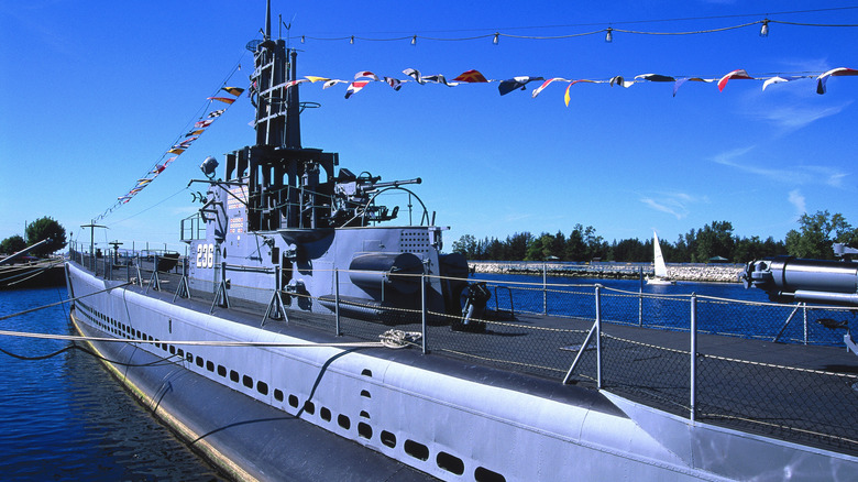 View of USS Silversides submarine museum under blue skies.