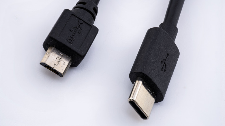 Micro USB and USB C cables side by side with white background