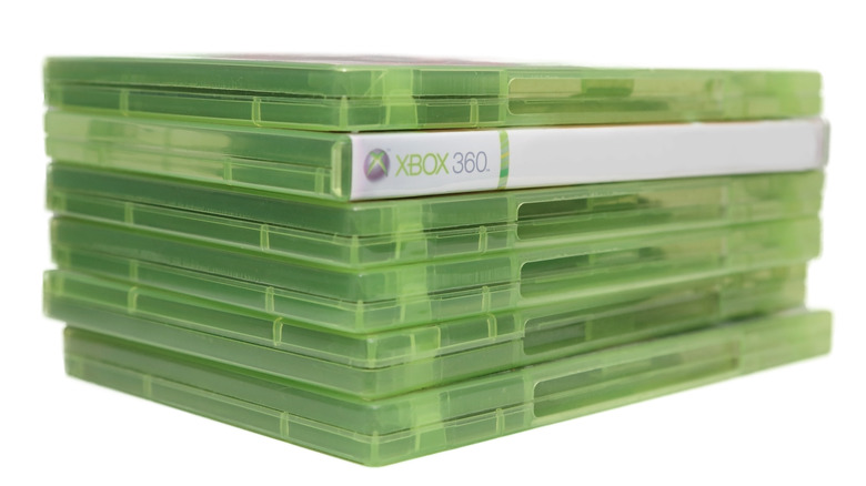 Stack of Xbox 360 game cases