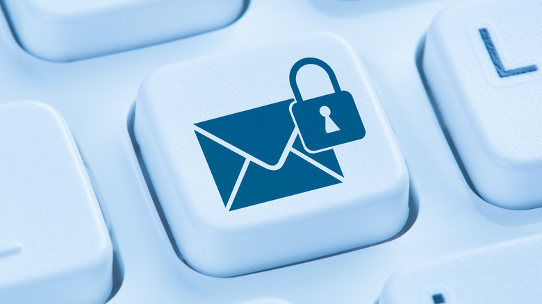 Keyboard key with email icon and lock icon