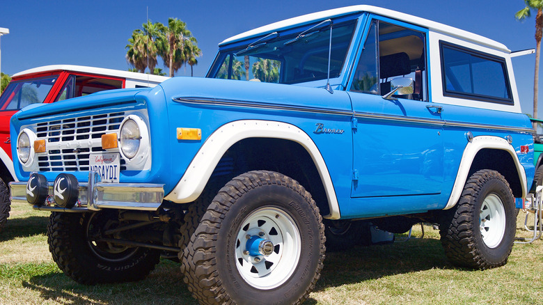 a blue and white vintage Ford bronco