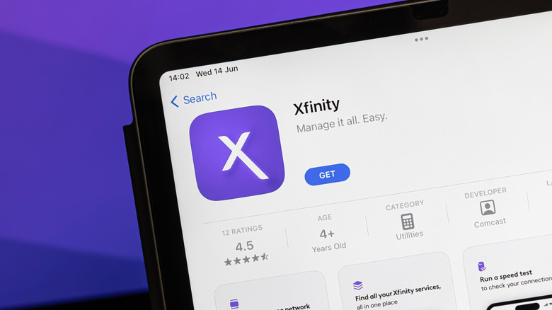Xfinity app on the Apple App Store on an iPad placed against a violet background