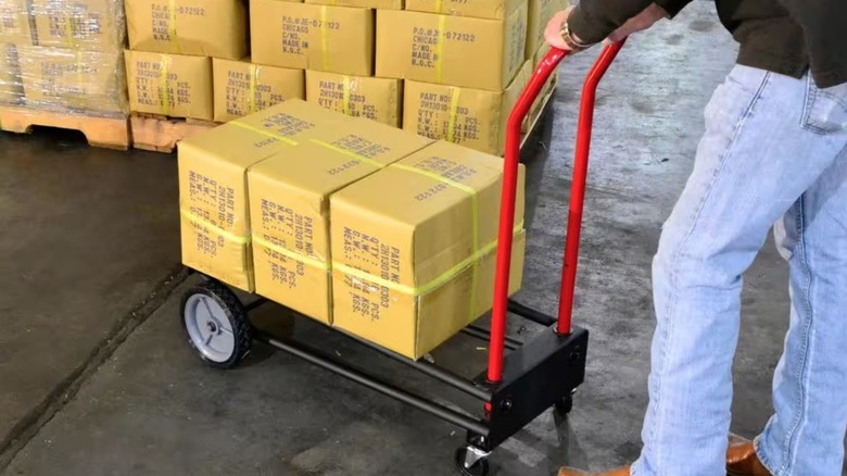 Person using Milwaukee hand cart