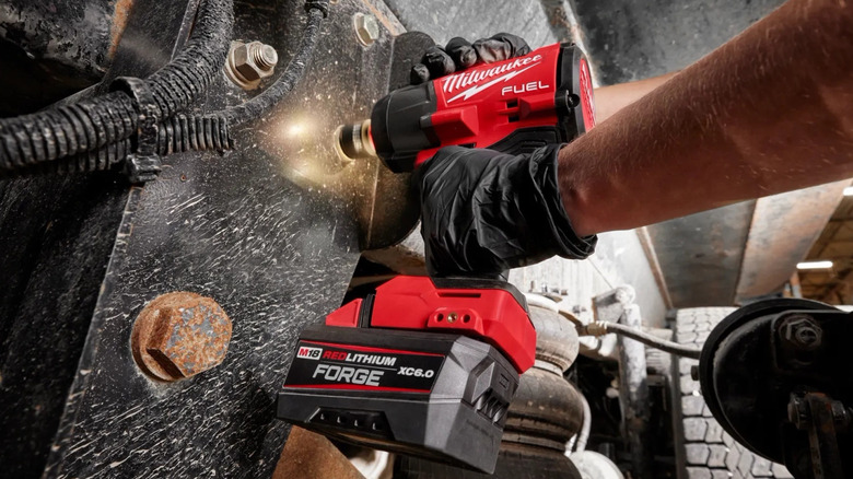 Milwaukee M18 Forge battery in use in a tool