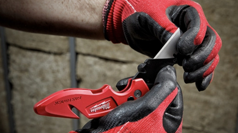 person using Milwaukee fastback