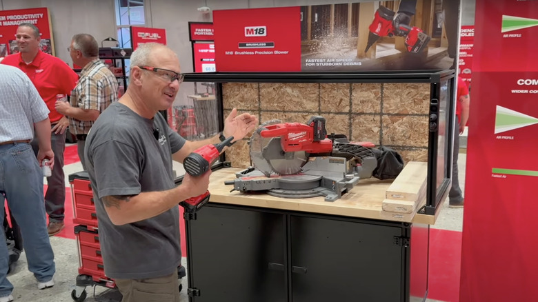 An old person testing the Milwaukee precision blower