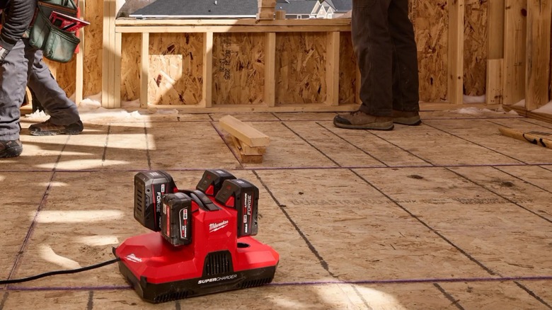 M18 & M12 Four Bay Simultaneous Super Charger in use on a job site