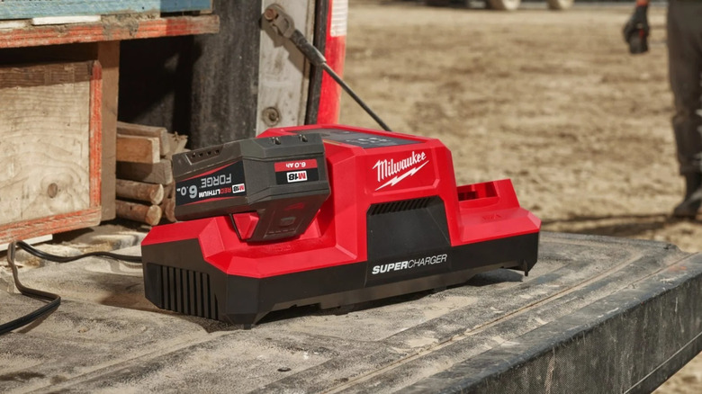 Milwaukee Super Charger charging one battery pack in a construction site