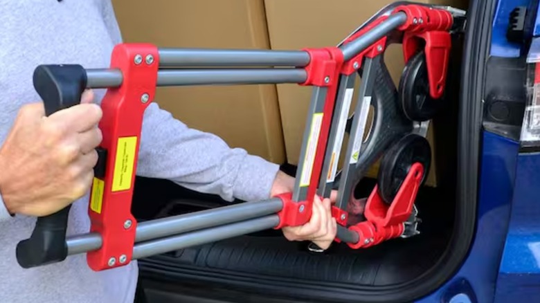 sticking Milwaukee hand truck in car