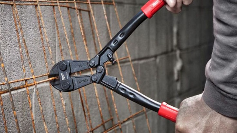 cutting old steel components with Milwaukee bolt cutter
