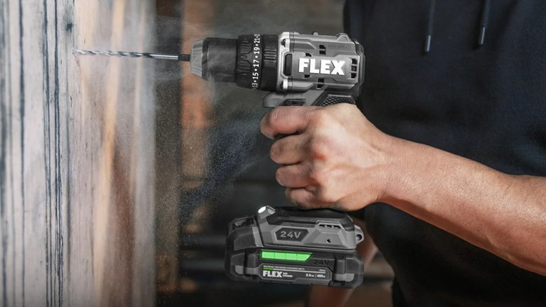 A Flex 24V Hammer Drill in use