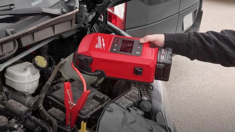 Milwaukee Hot Shot charger charging a car battery
