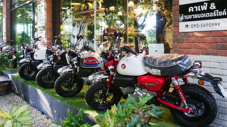 Honda mini motorcycles display at a sell gallery during the day