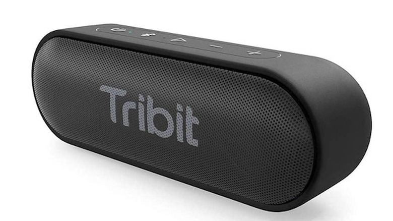 Tribit speaker on its side with the Tribit logo on a white background