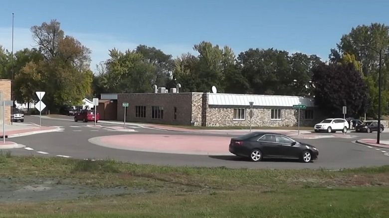 A mini-roundabout in use in a Minnesota neighborhood.