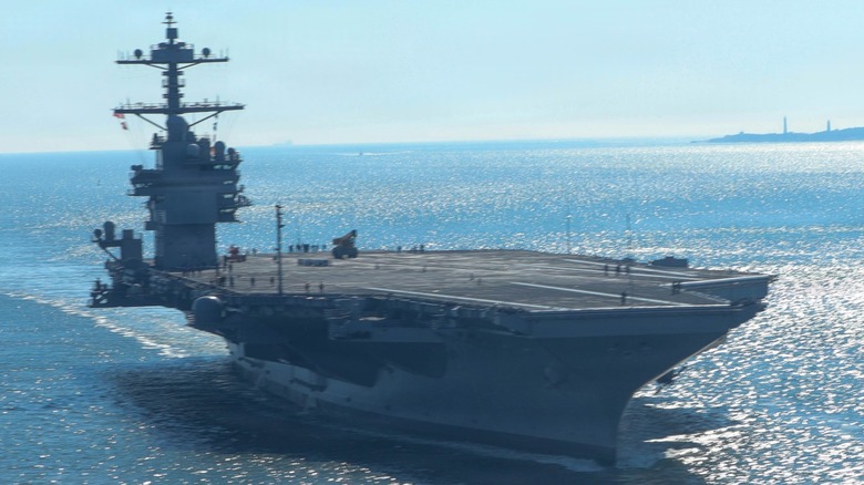 The USS John F. Kennedy (CVN 79) transiting to Naval Air Station Norfolk, Virginia, in 2026