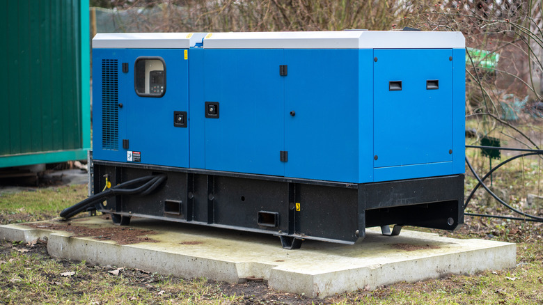 Blue generator placed on a flat, even surface