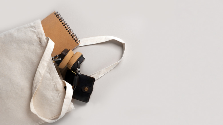 Headphones thrown into a bag 